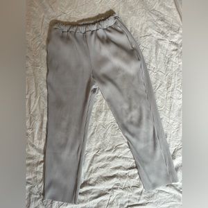 Icy Grey plisse pants in the style of issey miyake, pleated